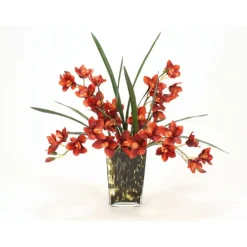 Waterlook® Rust Cymbidium Orchids with Foliage in Leopard-Spotted Glass Vase